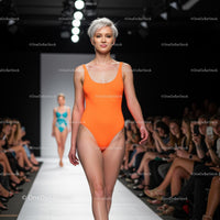 Glamorous Runway Model in Green Bikini at Fashion Show