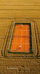 Tennis Court Amidst Golden Wheat Fields