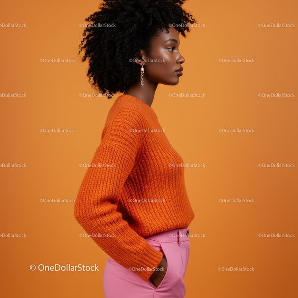 Stylish Woman in Vibrant Orange Sweater and Pink Trousers