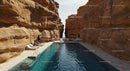 Luxury Poolside Oasis Amidst Majestic Sandstone Cliffs