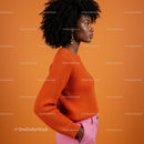 Stylish Woman in Orange Sweater and Pink Pants