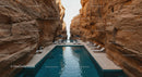 Luxurious Infinity Pool Amidst Majestic Canyon Walls
