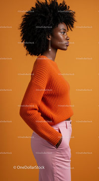 Stylish Woman in Orange Sweater and Pink Pants