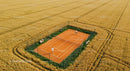 Luxury Outdoor Tennis Court Surrounded by Lush Greenery