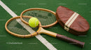 Vintage Wooden Tennis Rackets on Green Court