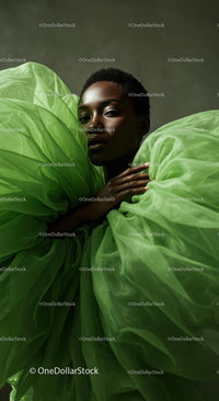 Elegant Woman in Vibrant Green Tulle Fabric