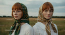 Twin Sisters in Headscarves in Serene Countryside
