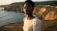 Elegant Woman Posing by Coastal Cliffs at Sunset