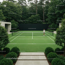 Modern Tennis Court Amidst Lush Green Landscape