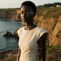 Elegant Woman at Sunset by Scenic Coastal Cliffs