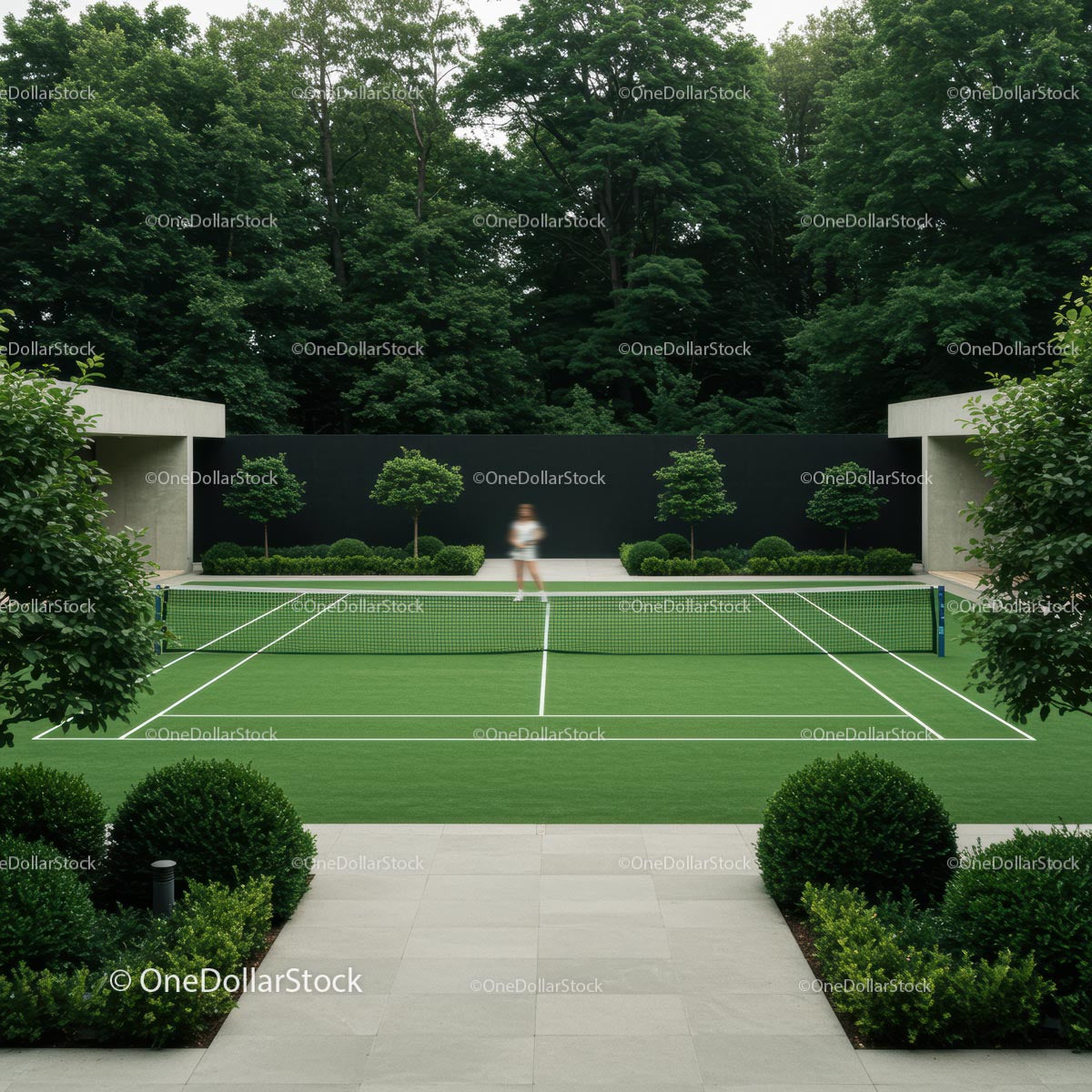 Private Tennis Court Surrounded by Lush Greenery