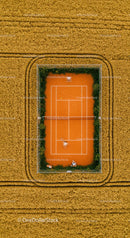 Aerial View of Tennis Court in Wheat Field