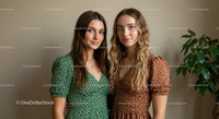Two Young Women in Polka Dot Dresses Indoors