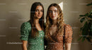 Two Women in Polka Dot Dresses in Soft Natural Light