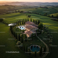 Tuscany Villa Surrounded by Cypress Trees at Sunset