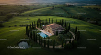 Tuscan Villa Surrounded by Cypress Trees at Sunset