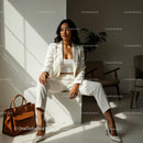 Confident Woman in Elegant White Suit in Modern Office