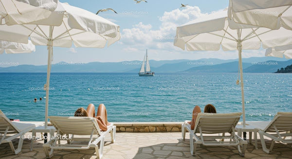 Serene Beachfront Relaxation with Sailboat on Horizon