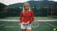 Young Female Tennis Player in Red on Outdoor Court