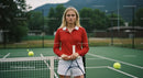 Young Female Tennis Player on Outdoor Court