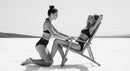 Two Women Enjoying a Relaxing Day at the Beach