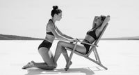Two Women Enjoying a Relaxing Day at the Beach