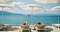 Lazy Day on Sun Loungers by the Blue Sea