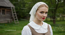Young Woman with Lace Headscarf in Bucolic Setting