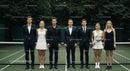 Luxury Outdoor Tennis Court Surrounded by Lush Greenery