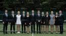 Group of Professionals in Formal Attire on Tennis Court