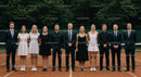 Tennis Team Portrait on Clay Court with Formal and Sporty Attire