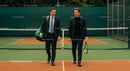 Businessmen Networking on Tennis Court with Rackets