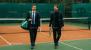 Businessmen Networking on Tennis Court in Suits