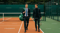 Businessmen in Suits on Tennis Court