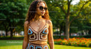 Stylish Woman in Crochet Top Enjoying a Sunny Day in Park