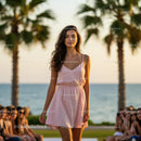 Model in Pink Dress Walking on Beachside Runway
