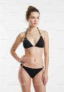 Elegant Woman in Black Bikini Posing Confidently