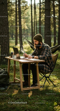 Man Working Remotely in Forest with Laptop