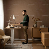 Man Working at a Standing Desk in a Stylish Home Office