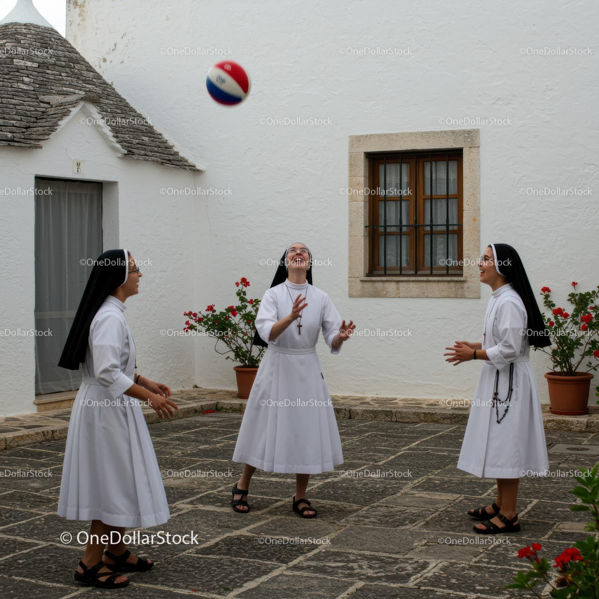 Nuns Enjoying a Game in a Courtyard Setting