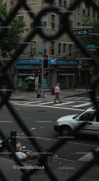 Urban Intersection Scene with Blurred Pedestrians and Traffic