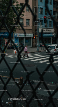 Urban Street View Through Chain Link Fence