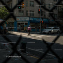 Busy City Intersection with Pedestrian and Cars