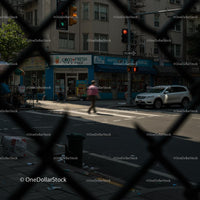 Busy City Intersection with Pedestrian and Cars