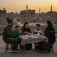 Family Enjoying Rooftop Dinner at Sunset