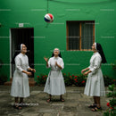 Nuns Enjoying a Leisurely Ball Game in a Courtyard