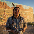 Native American Artist with Desert Mural Backdrop