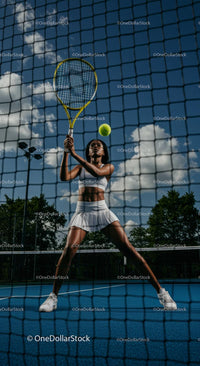 Female Tennis Player in Action on Sunny Outdoor Court