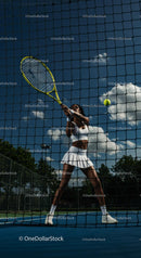 Female Tennis Player in Action on Sunny Day