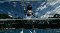Female Tennis Player in Action on Sunny Court